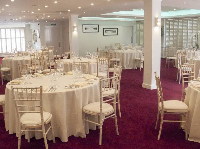 Elegant dinner setup in the Edwards Room at 11 Cavendish Square, featuring sophisticated table arrangements and lighting.